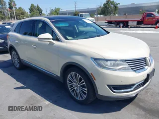 2016 Lincoln MKX Reserve z VIN 2LMTJ8LR7GBL59941, wystawiony jako IAAI lot #42415417 z przebiegiem 243 526 mil mil oraz . Historia ofert i sprzedaży dostępna na DreamBid. Obrazek 1.