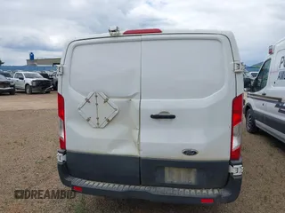 2015 Ford Transit Cargo z VIN 1FTNE1YM7FKB14241, wystawiony jako IAAI lot #42126200 z przebiegiem 314 744 mil mil oraz . Historia ofert i sprzedaży dostępna na DreamBid. Obrazek 17.