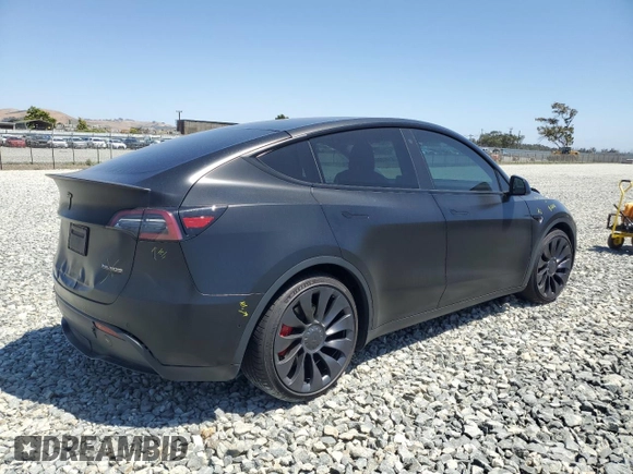 2022 Tesla Model Y Performance with VIN 7SAYGDEF8NF492954, listed as a Copart auction lot 61419965 with 24,885 mi miles and Salvage title. Bid and sale history available at DreamBid. Image 3.
