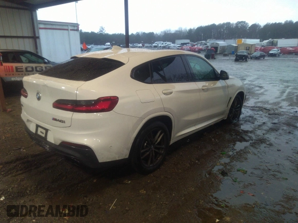2020 BMW X4 M40i with VIN 5UX2V5C04L9C04255, listed as a IAAI auction lot 41574802 with 35,101 mi miles and . Bid and sale history available at DreamBid. Image 4.