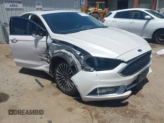 2017 Ford Fusion Titanium z VIN 3FA6P0SU0HR329224, wystawiony jako IAAI lot #42291605 z przebiegiem 176 728 mil mil oraz . Historia ofert i sprzedaży dostępna na DreamBid. Obrazek 1.
