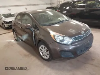 2013 Kia Rio SX with VIN KNADN5A32D6136879, listed as a IAAI auction lot 41815817 with 110,763 mi miles. Bid and sale history available at carsss.com. Image 1.