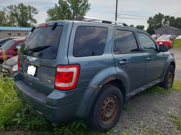 2011 Ford Escape Limited z VIN 1FMCU9EG1BKC66402, wystawiony jako Copart lot #66498925 z przebiegiem 223 257 mil mil oraz Czysty tytuł • Clean title. Historia ofert i sprzedaży dostępna na DreamBid. Obrazek 4.