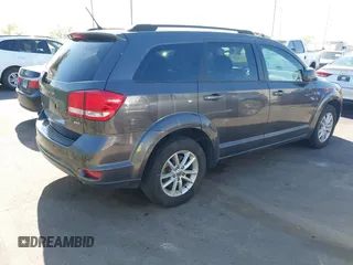2017 Dodge Journey SXT with VIN 3C4PDCBBXHT506498, listed as a IAAI auction lot 42057667 with 110,059 mi miles and . Bid and sale history available at DreamBid. Image 4.