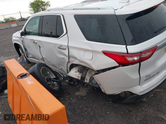 2018 Chevrolet Traverse High Country with VIN 1GNEVKKW4JJ133786, listed as a IAAI auction lot 42076685 with 167,787 mi miles and . Bid and sale history available at DreamBid. Image 3.