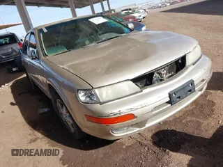 1999 Nissan Maxima GXE z VIN JN1CA21D3XM404472, wystawiony jako IAAI lot #41426281 z przebiegiem 154 468 mil mil oraz . Historia ofert i sprzedaży dostępna na DreamBid. Obrazek 1.