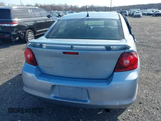 2013 Dodge Avenger SXT with VIN 1C3CDZCB5DN544333, listed as a IAAI auction lot 41655816 with 95,894 mi miles and . Bid and sale history available at carsss.com. Image 16.