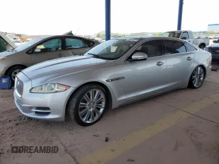 2012 Jaguar XJ Supercharged with VIN SAJWA2GE1CMV28584, listed as a Copart auction lot 63313275 with 74,023 mi miles and Clean title. Bid and sale history available at DreamBid. Image 1.