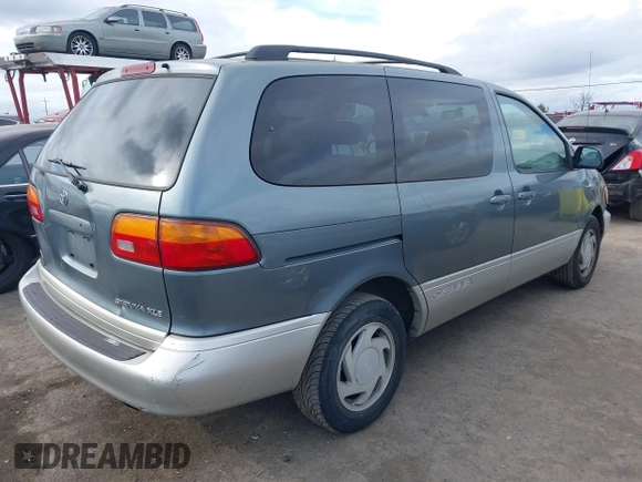 1999 Toyota Sienna LE with VIN 4T3ZF13C2XU136847, listed as a IAAI auction lot 41663608 with 178,581 mi miles. Bid and sale history available at carsss.com. Image 4.