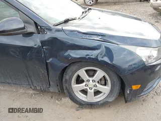2014 Chevrolet Cruze 1LT with VIN 1G1PC5SB7E7460779, listed as a IAAI auction lot 41910952 with 76,539 mi miles and . Bid and sale history available at DreamBid. Image 6.