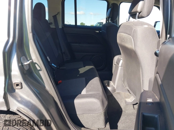 2014 Jeep Patriot Sport with VIN 1C4NJRBB5ED574390, listed as a IAAI auction lot 41949395 with 61,911 mi miles. Bid and sale history available at carsss.com. Image 8.