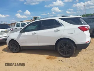 2019 Chevrolet Equinox Premier z VIN 2GNAXPEX9K6177386, wystawiony jako IAAI lot #42172103 z przebiegiem 61 045 mil mil oraz . Historia ofert i sprzedaży dostępna na DreamBid. Obrazek 14.