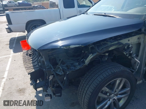 2016 Volkswagen Touareg Sport with VIN WVGEF9BP7GD010252, listed as a IAAI auction lot 42465165 with Not provided miles and . Bid and sale history available at DreamBid. Image 6.