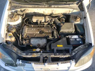 2004 Hyundai Accent GL with VIN KMHCG35C44U284868, listed as a Copart auction lot 74054884 with 87,259 mi miles and Clean Title. Bid and sale history available at carsss.com. Image 11.