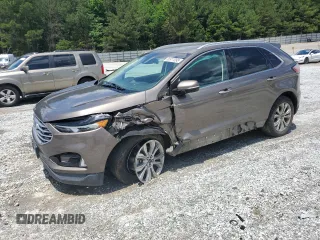 2019 Ford Edge Titanium with VIN 2FMPK4K90KBB81531, listed as a Copart auction lot 56917095 with 133,430 mi miles and Salvage title. Bid and sale history available at DreamBid. Image 1.