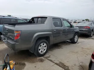 2007 Honda Ridgeline RTL z VIN 2HJYK16577H511325, wystawiony jako Copart lot #57619725 z przebiegiem 161 037 mil mil oraz Szkoda całkowita • Salvage title. Historia ofert i sprzedaży dostępna na DreamBid. Obrazek 3.