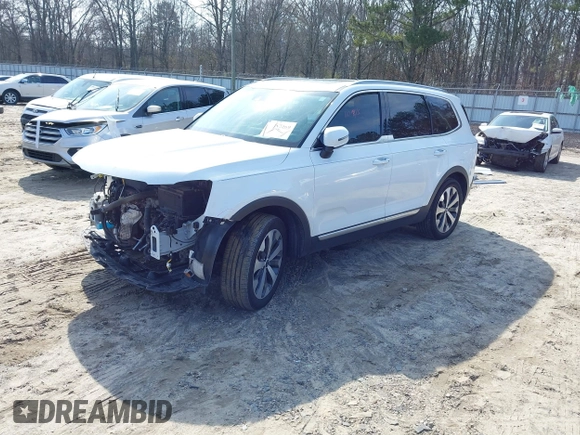 2020 Kia Telluride S with VIN 5XYP64HC2LG005623, listed as a IAAI auction lot 41492269 with 137,147 mi miles and . Bid and sale history available at DreamBid. Image 2.