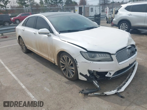 2017 Lincoln MKZ Reserve z VIN 3LN6L5EC2HR613827, wystawiony jako IAAI lot #41800613 z przebiegiem 199 097 mil mil oraz . Historia ofert i sprzedaży dostępna na DreamBid. Obrazek 1.