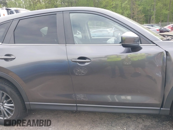 2017 Mazda CX-5 Touring z VIN JM3KFBCL4H0178747, wystawiony jako IAAI lot #42041380 z przebiegiem 112 083 mil mil oraz . Historia ofert i sprzedaży dostępna na DreamBid. Obrazek 13.
