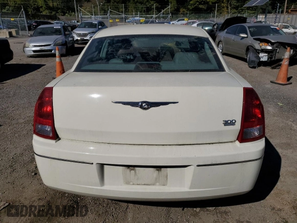 2005 Chrysler 300 with VIN 2C3JA53G55H584006, listed as a Copart auction lot 76698204 with 0 mi miles and Salvage Title. Bid and sale history available at carsss.com. Image 6.