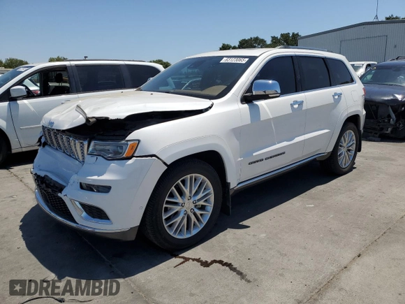 2018 Jeep Grand Cherokee Summit with VIN 1C4RJEJG9JC212554, listed as a Copart auction lot 63123065 with 82,976 mi miles and Salvage title. Bid and sale history available at DreamBid. Image 1.
