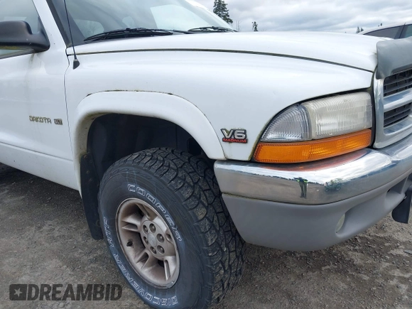 1997 Dodge Dakota z VIN 1B7GG23X5VS242535, wystawiony jako IAAI lot #41608146 z przebiegiem 125 189 mil mil oraz . Historia ofert i sprzedaży dostępna na DreamBid. Obrazek 6.