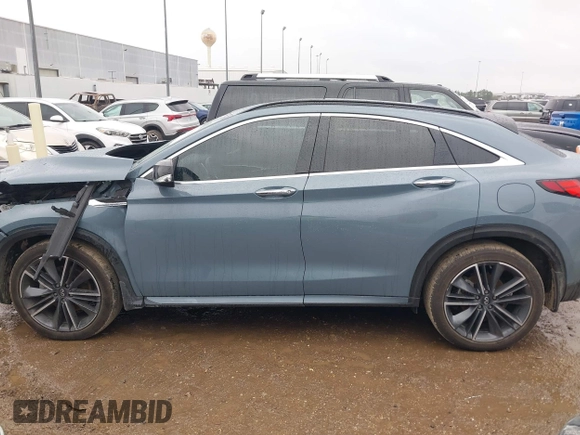 2023 Infiniti QX55 Luxe z VIN 3PCAJ5JRXPF109797, wystawiony jako IAAI lot #41455665 z przebiegiem 31 561 mil mil oraz . Historia ofert i sprzedaży dostępna na DreamBid. Obrazek 14.