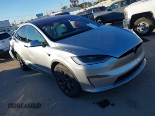 2024 Tesla Model X Plaid with VIN 7SAXCBE65RF453398, listed as a IAAI auction lot 41082484 with Not Provided miles and . Bid and sale history available at DreamBid. Image 1.