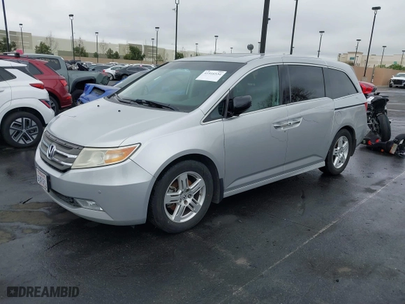 2012 Honda Odyssey Touring with VIN 5FNRL5H99CB055499, listed as a IAAI auction lot 41916534 with 278,435 mi miles. Bid and sale history available at carsss.com. Image 19.