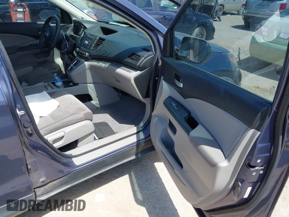 2013 Honda CR-V LX with VIN 3CZRM3H35DG702421, listed as a IAAI auction lot 42617178 with Not provided miles and . Bid and sale history available at DreamBid. Image 5.