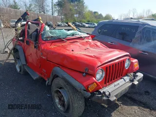 2004 Jeep Wrangler Sport with VIN 1J4FA49S14P803149, listed as a IAAI auction lot 42022481 with Not Provided miles. Bid and sale history available at carsss.com. Image 1.