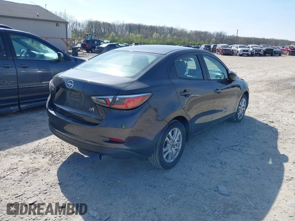 2016 Scion iA with VIN 3MYDLBZV3GY131783, listed as a IAAI auction lot 41999144 with 197,827 mi miles. Bid and sale history available at carsss.com. Image 4.
