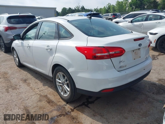 2015 Ford Focus SE with VIN 1FADP3F22FL376042, listed as a IAAI auction lot 42283236 with 76,675 mi miles and . Bid and sale history available at DreamBid. Image 3.