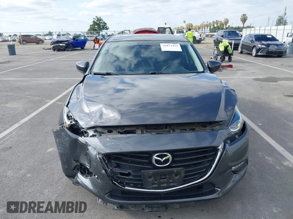 2018 Mazda 3 Touring with VIN 3MZBN1L32JM268582, listed as a IAAI auction lot 42072435 with 61,417 mi miles. Bid and sale history available at carsss.com. Image 12.