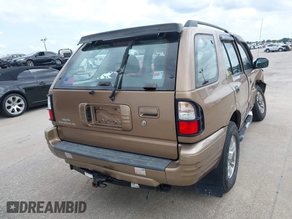 2000 Isuzu Rodeo S with VIN 4S2CK58W3Y4316966, listed as a IAAI auction lot 42003598 with 106,187 mi miles and . Bid and sale history available at carsss.com. Image 16.