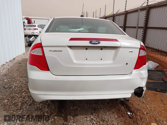 2012 Ford Fusion SE z VIN 3FAHP0HA3CR285217, wystawiony jako IAAI lot #41792353 z przebiegiem 190 916 mil mil oraz . Historia ofert i sprzedaży dostępna na DreamBid. Obrazek 16.