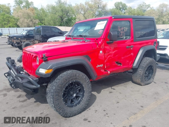 2019 Jeep Wrangler Sport S z VIN 1C4GJXAG4KW652569, wystawiony jako IAAI lot #42116457 z przebiegiem 46 007 mil mil oraz . Historia ofert i sprzedaży dostępna na DreamBid. Obrazek 19.