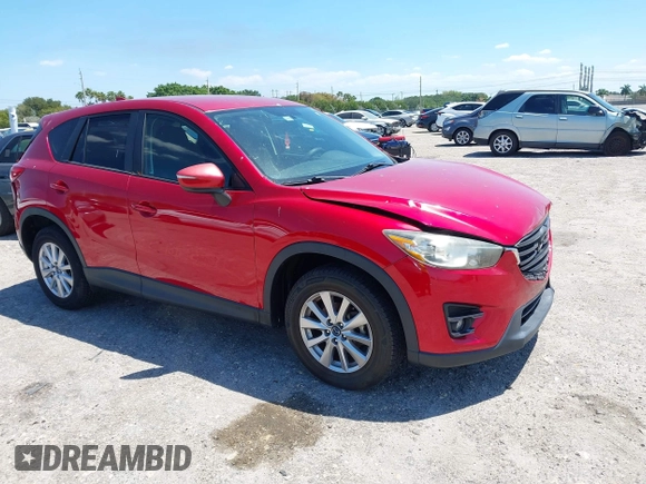 2016 Mazda CX-5 Touring with VIN JM3KE2CY6G0830409, listed as a IAAI auction lot 42049299 with 39,317 mi miles. Bid and sale history available at carsss.com. Image 1.