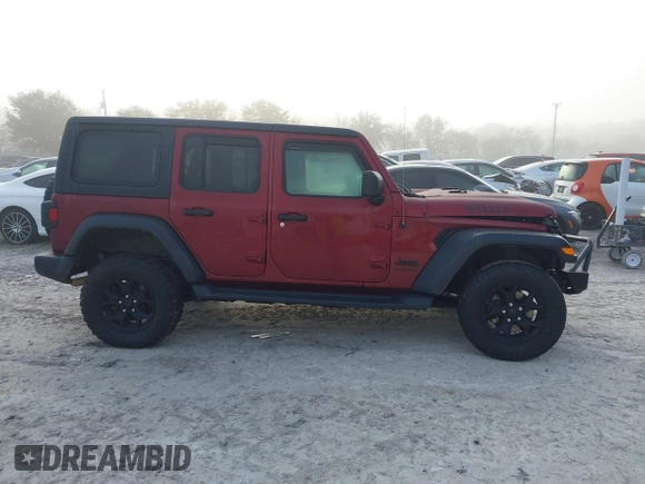 2021 Jeep Wrangler Unlimited Willys with VIN 1C4HJXDN6MW815448, listed as a IAAI auction lot 41459304 with 52,474 mi miles and . Bid and sale history available at DreamBid. Image 13.