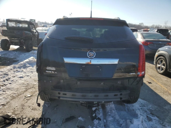2014 Cadillac SRX Premium Collection z VIN 3GYFNGE38ES577313, wystawiony jako Copart lot #87679045 z przebiegiem 92 070 mil mil oraz Szkoda całkowita • Salvage title. Historia ofert i sprzedaży dostępna na DreamBid. Obrazek 6.