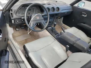 1983 Datsun 280ZX z VIN JN1CZ06S1DX700637, wystawiony jako Copart lot #53893855 z przebiegiem 93 909 mil mil oraz Tytuł czysty. Historia ofert i sprzedaży dostępna na DreamBid. Obrazek 8.
