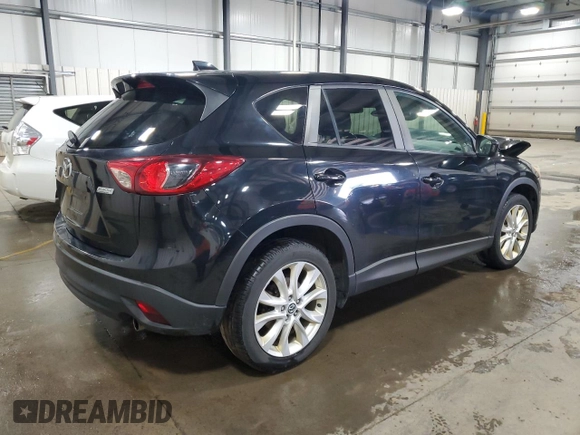 2014 Mazda CX-5 Grand Touring with VIN JM3KE4DY0E0322606, listed as a Copart auction lot 54381815 with 216,022 mi miles and Salvage Title. Bid and sale history available at DreamBid. Image 3.