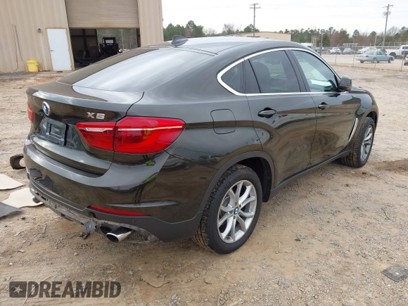 2015 BMW X6 xDrive35i z VIN 5UXKU2C56F0N76862, wystawiony jako IAAI lot #41747776 z przebiegiem 119 426 mil mil oraz . Historia ofert i sprzedaży dostępna na DreamBid. Obrazek 4.