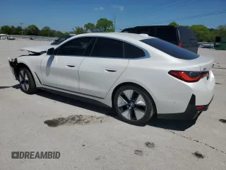 2023 BMW i4 eDrive35 with VIN WBY43AW02PFP53587, listed as a Copart auction lot 51493324 with 15,595 mi miles. Bid and sale history available at carsss.com. Image 2.