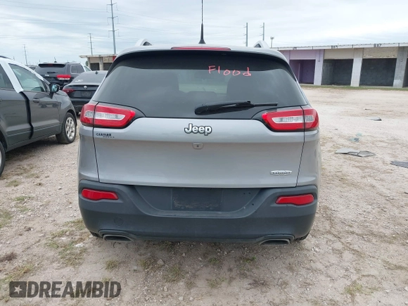 2018 Jeep Cherokee Latitude with VIN 1C4PJLCX4JD559096, listed as a IAAI auction lot 41925282 with 127,488 mi miles and . Bid and sale history available at DreamBid. Image 16.