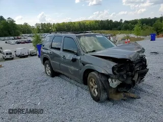 2006 Mazda Tribute S with VIN 4F2YZ06186KM08378, listed as a Copart auction lot 69391894 with Not Provided miles and Salvage Title. Bid and sale history available at DreamBid. Image 12.