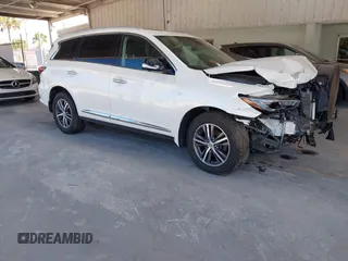 2020 Infiniti QX60 LUXE with VIN 5N1DL0MM9LC503000, listed as a IAAI auction lot 41650483 with 53,327 mi miles. Bid and sale history available at carsss.com. Image 1.