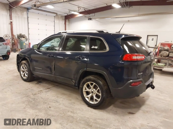 2014 Jeep Cherokee Latitude with VIN 1C4PJMCS9EW239549, listed as a IAAI auction lot 41156954 with 167,331 mi miles and . Bid and sale history available at DreamBid. Image 3.
