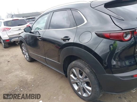 2023 Mazda CX-30 S Carbon Edition with VIN 3MVDMBCMXPM553129, listed as a IAAI auction lot 41864876 with 18,317 mi miles and . Bid and sale history available at DreamBid. Image 15.
