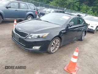 2014 Kia Optima SX Turbo with VIN 5XXGR4A61EG294366, listed as a IAAI auction lot 42540516 with 195,335 mi miles and . Bid and sale history available at DreamBid. Image 2.